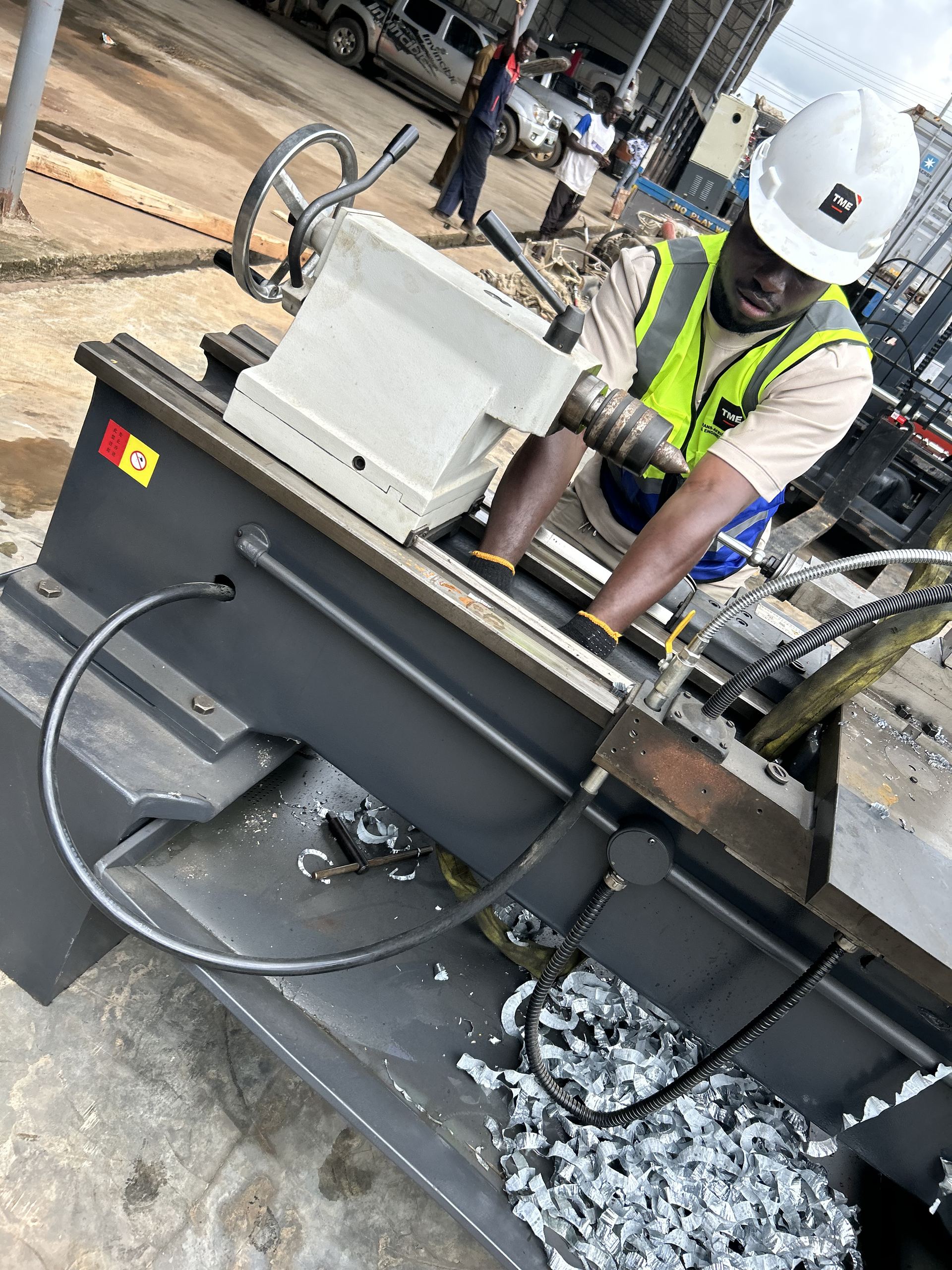 TME Africa team member test-running a lathe machine