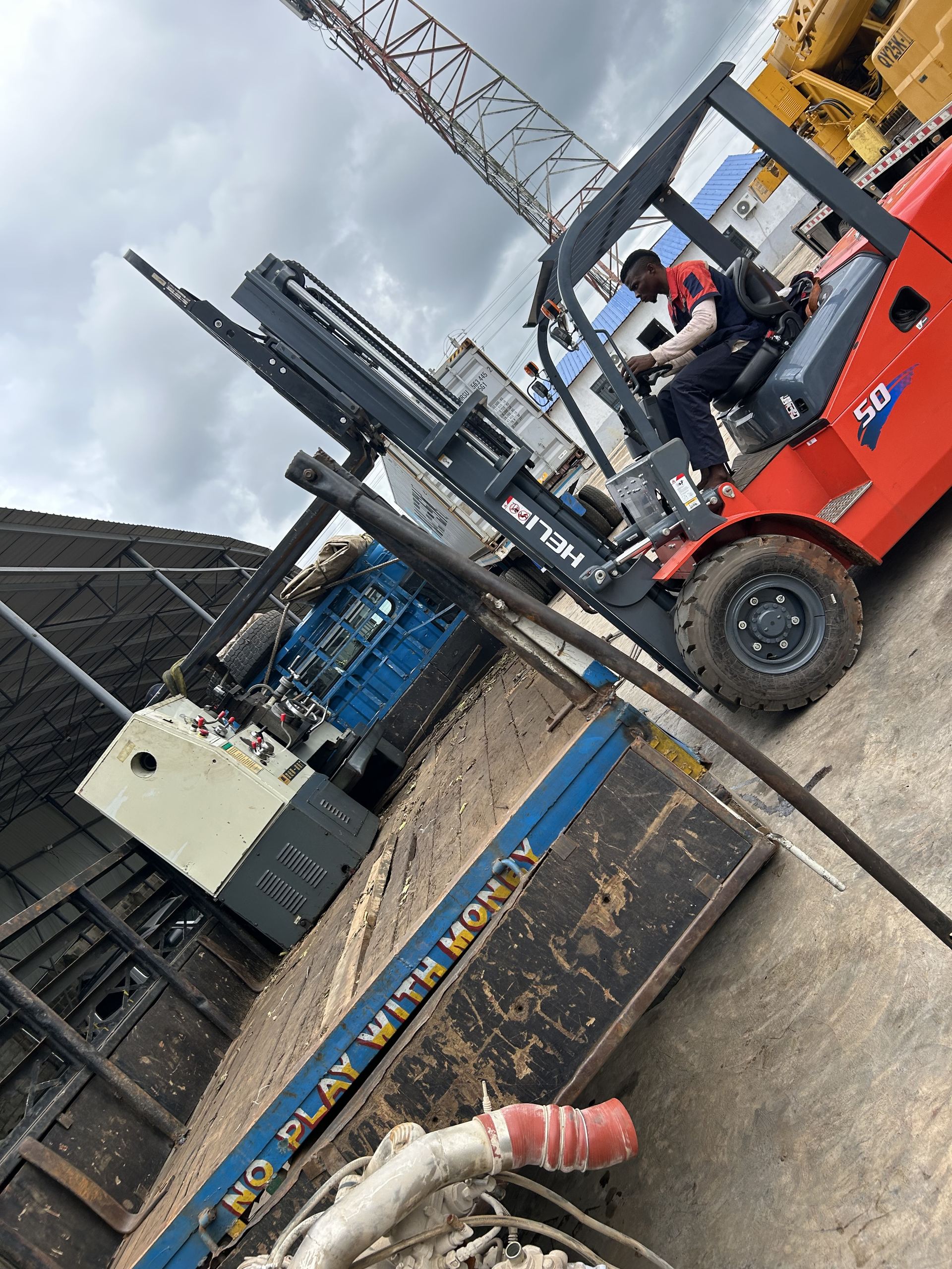 Machinery secured on the delivery truck ready for dispatch